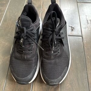Nike women’s Black and White Sneakers